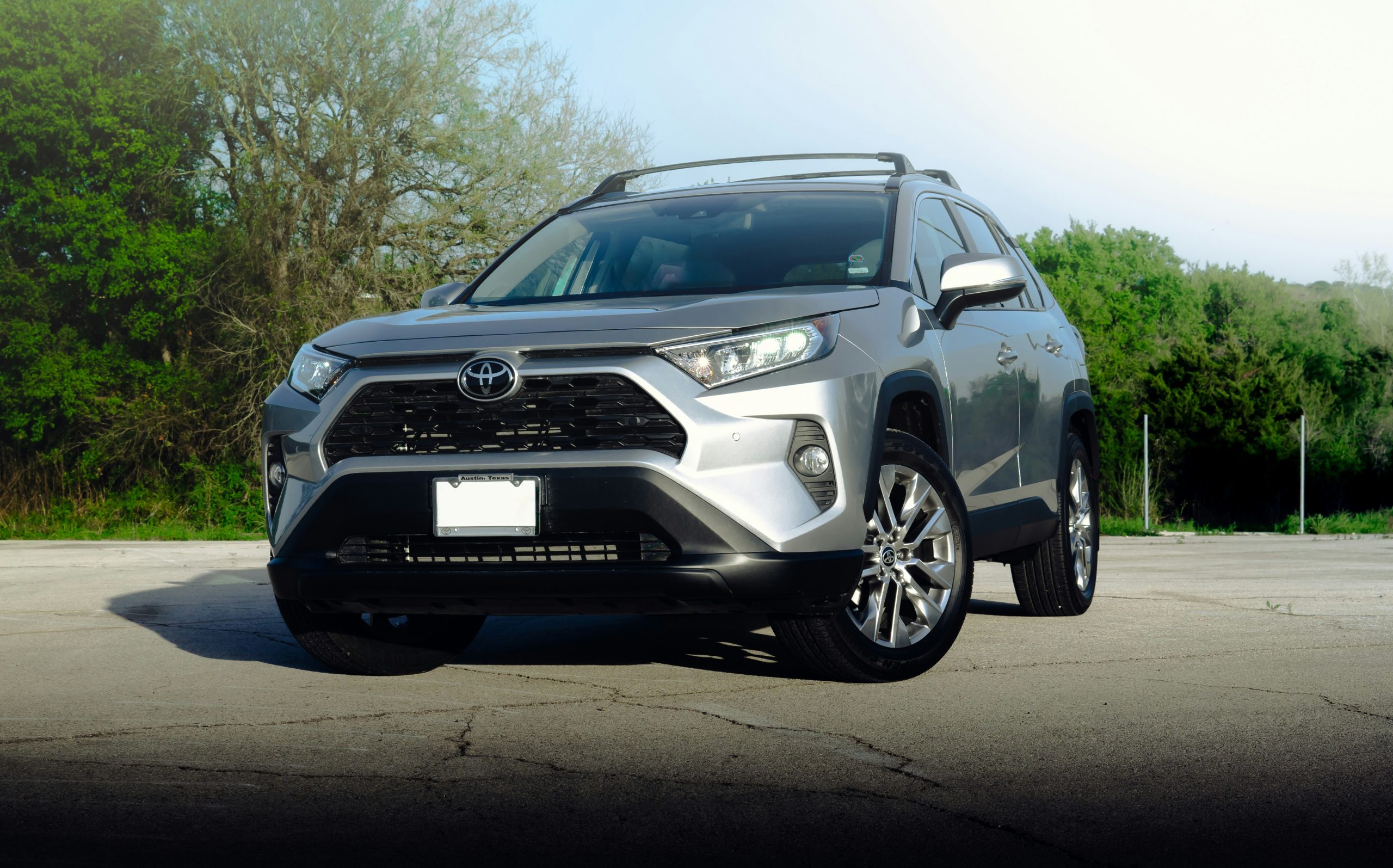 black and silver toyota suv RAV4
