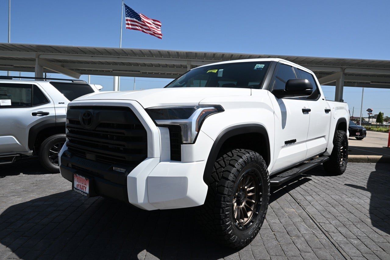A white 2026 Toyota Tundra on the Toyota of Katy dealership lot.